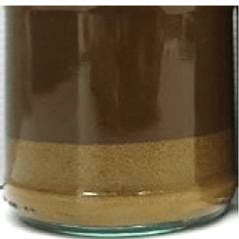 Closeup of separation in milk containing no enzymes