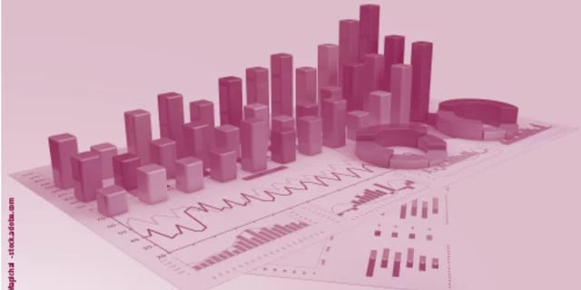 Pink-tinted image of various 3D charts: bar, line, and pie, on paper.