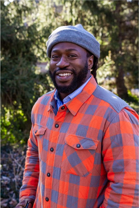 People in nature, Dress shirt, Smile, Tartan, Beard, Plant, Botany, Sleeve, Cap, Collar