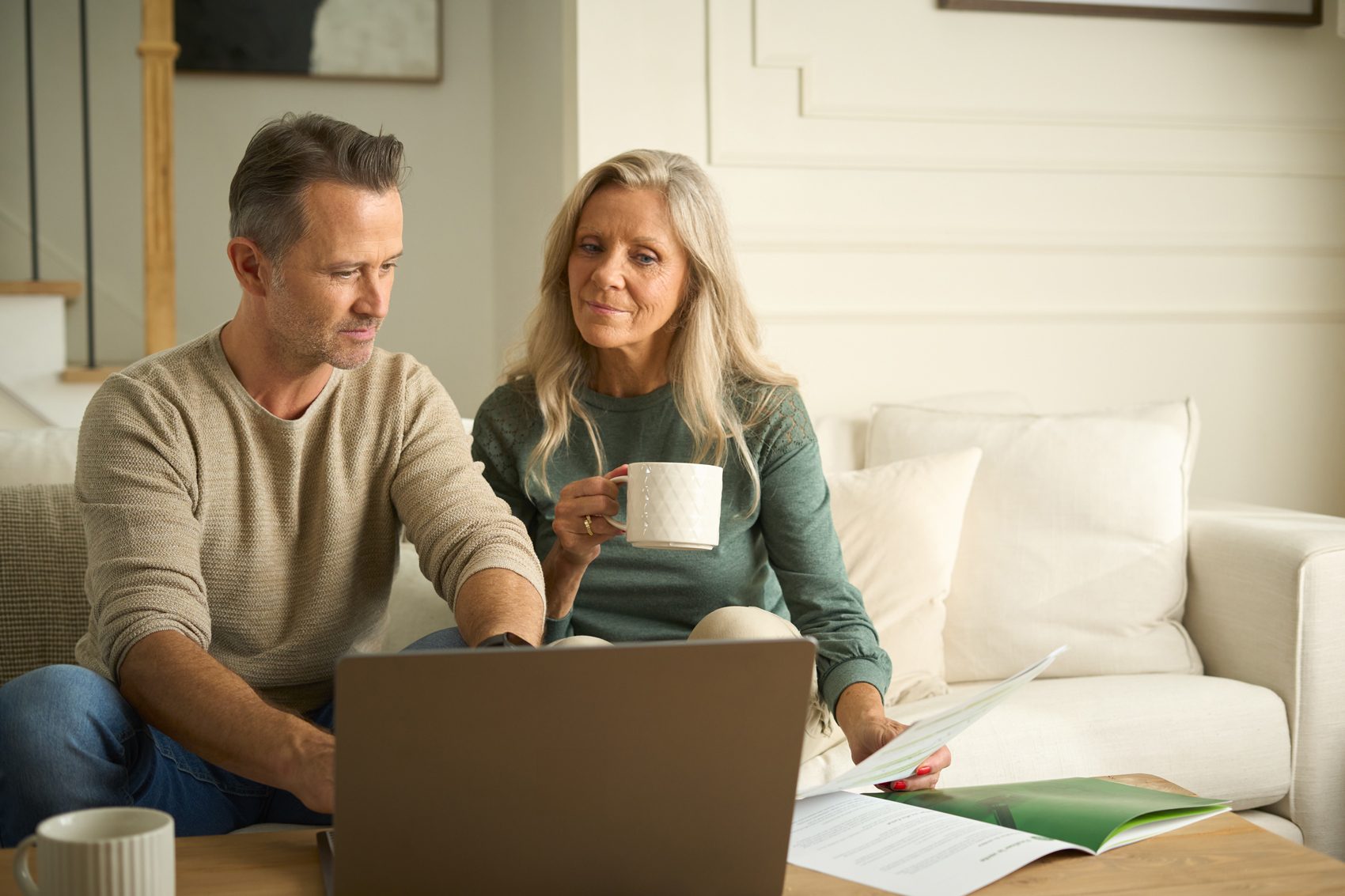 Interior design, Living room, Furniture, Trousers, Comfort, Sitting, Couch, Home, Gadget, Conversation