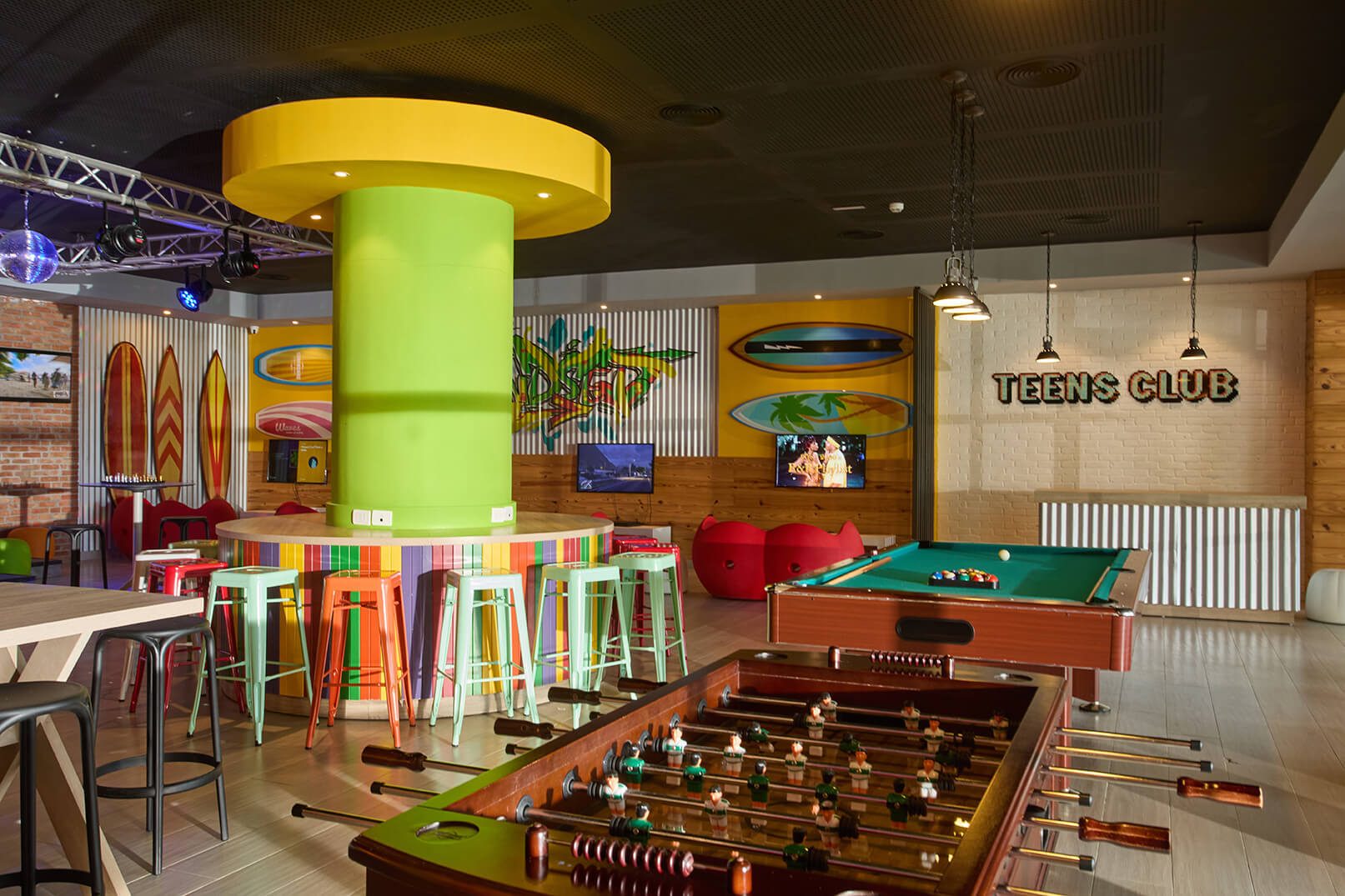 Interior design, Light fixture, Recreation room, Wood, Furniture, Ceiling, Lighting, Flooring, Chair