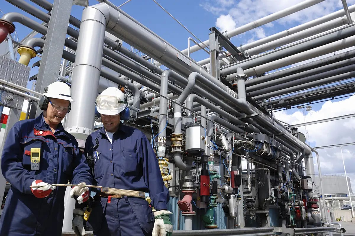 Hard hat, Motor vehicle, Pipeline transport, Workwear, Cloud, Sky, Helmet, Engineer, Tradesman, Industry