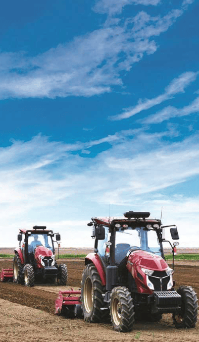 Automotive tire, Motor vehicle, Wheel, Sky, Cloud, Ecoregion, Tractor, Tread