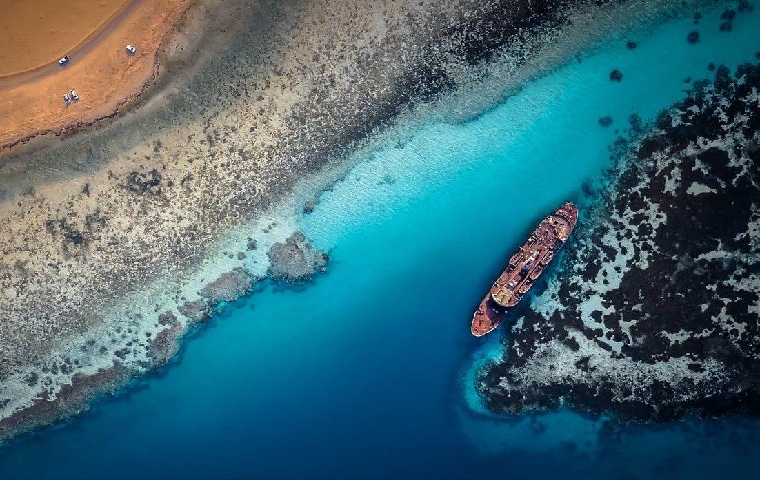 Coastal and oceanic landforms, Body of water, Natural landscape, Daytime, Blue, Nature, Azure, Beach