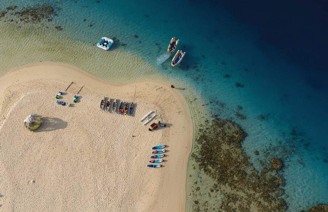 Coastal and oceanic landforms, People on beach, Body of water, Azure