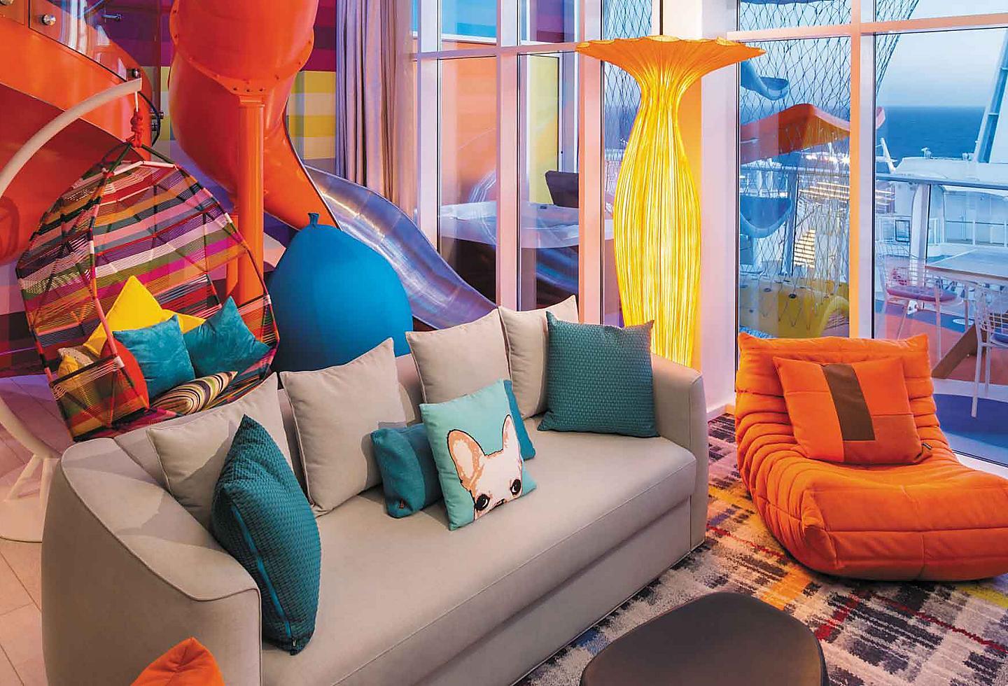 Interior design, Living room, Furniture, Blue, Azure, Textile, Orange, Couch, Aqua