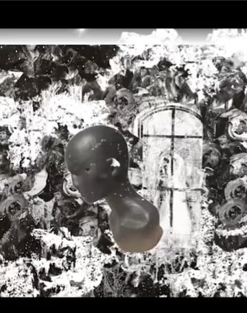 Abstract black and white: dark floating head, faint arched tombstone.