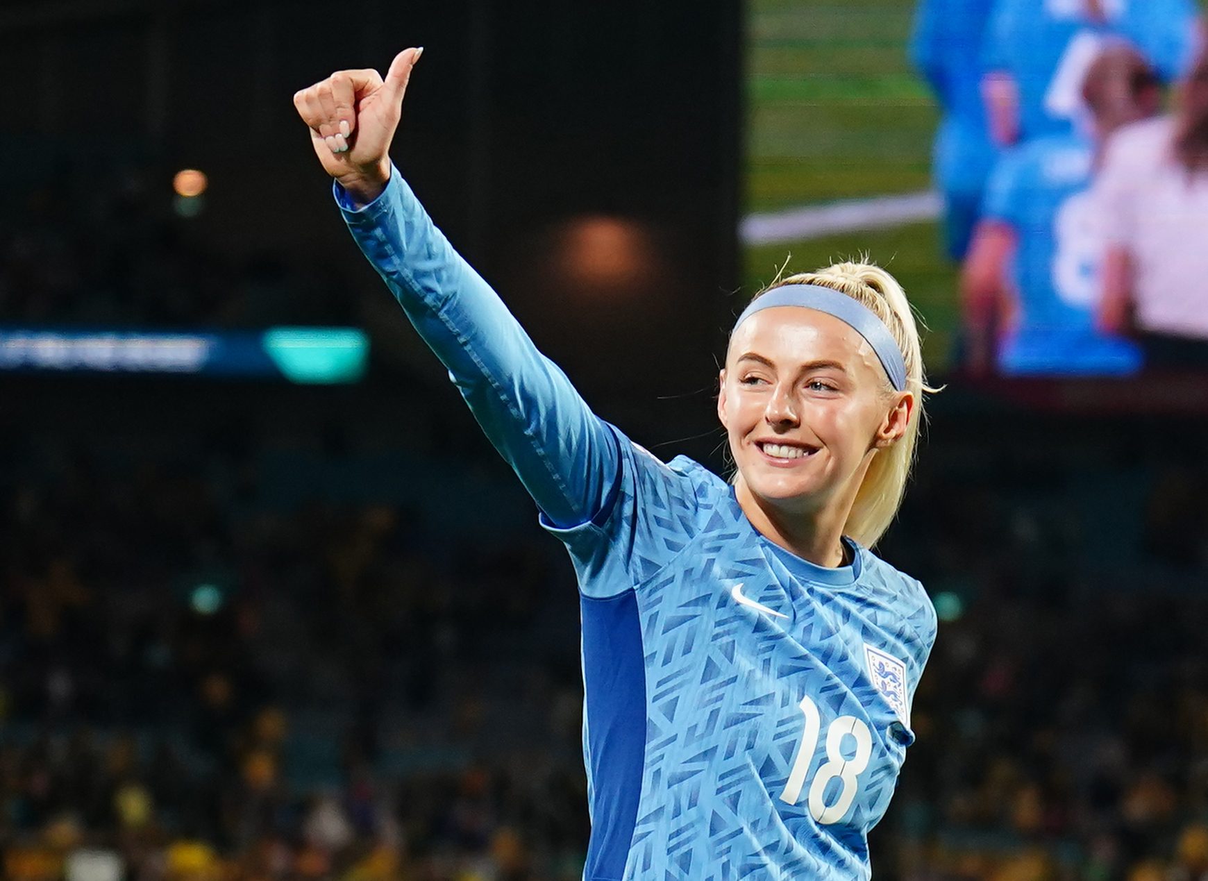 Chloe Kelly in England kit with thumb up in the air