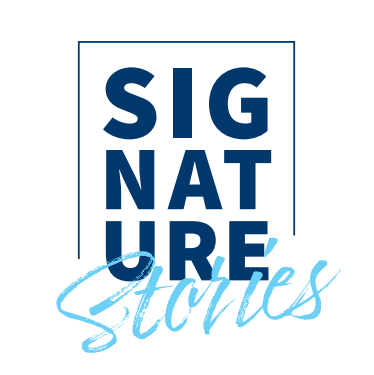 SIGNATURE Stories logo: stacked 'SIGNATURE' in blue block text, with 'Stories' in blue script.
