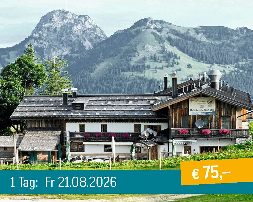 A traditional wooden ski hut with balconies and flowers, against majestic green mountains.