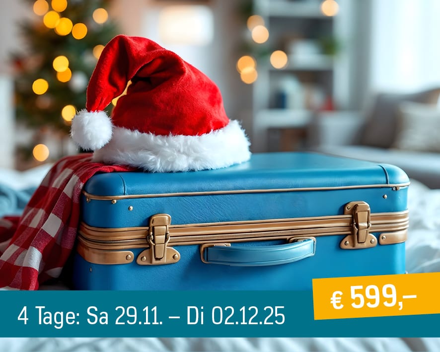 Santa hat on blue suitcase, Christmas trip offer: 4 days, Nov 29 - Dec 2, 2025, for €599.