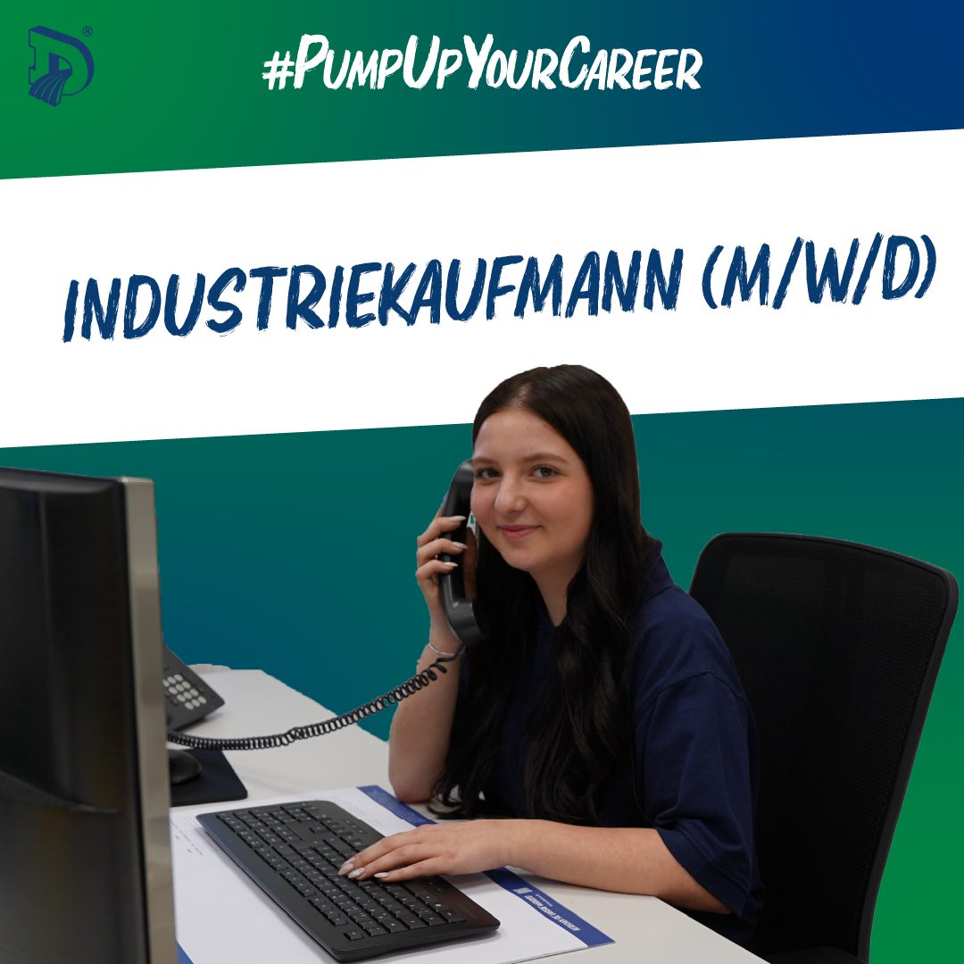 Smiling woman at office desk on phone. Career ad for Industriekaufmann (M/W/D). #PumpUpYourCareer