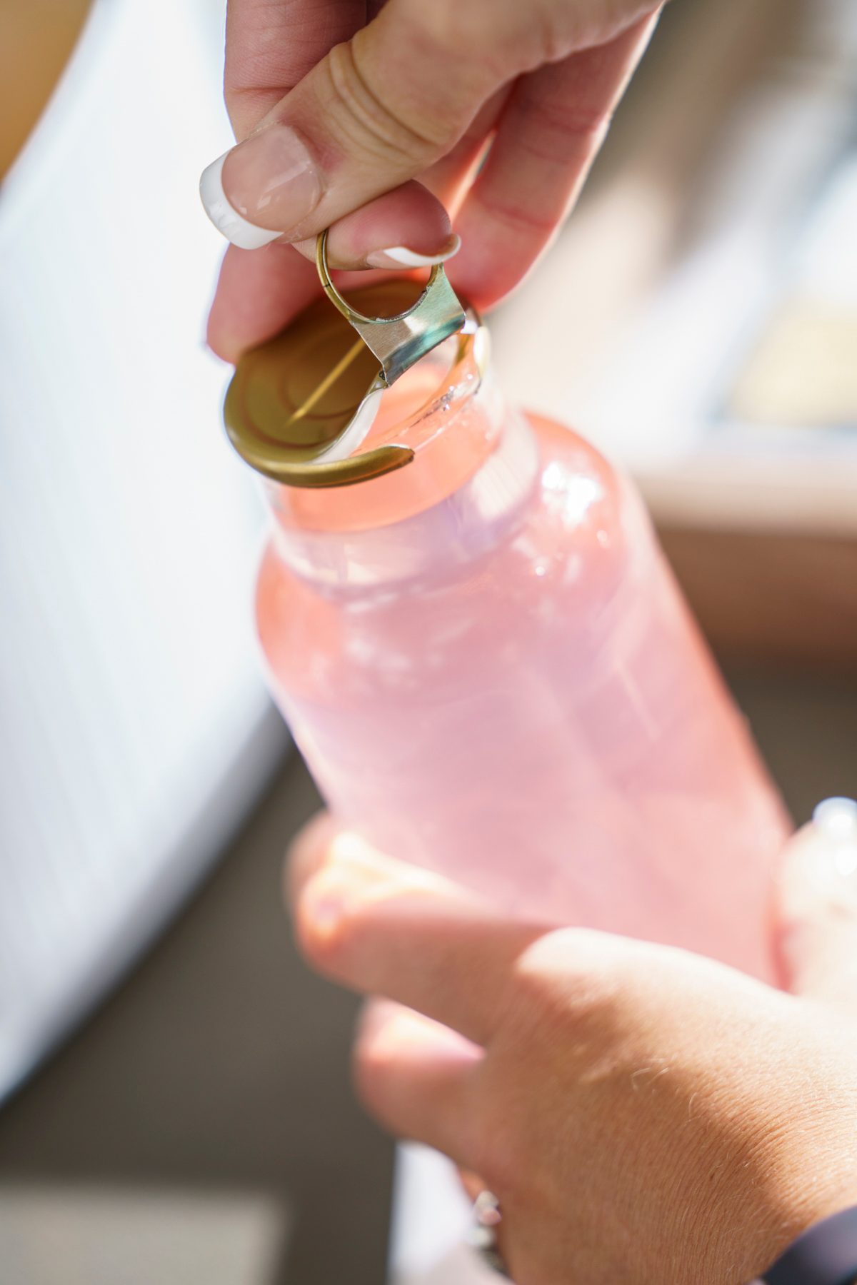 Plastic bottle, Hand, Liquid, Drinkware, Fluid, Solution, Gesture, Finger, Thumb