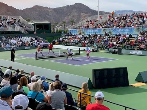 Sports equipment, Field house, Tennis player, Racquet sport, Sky, Racketlon