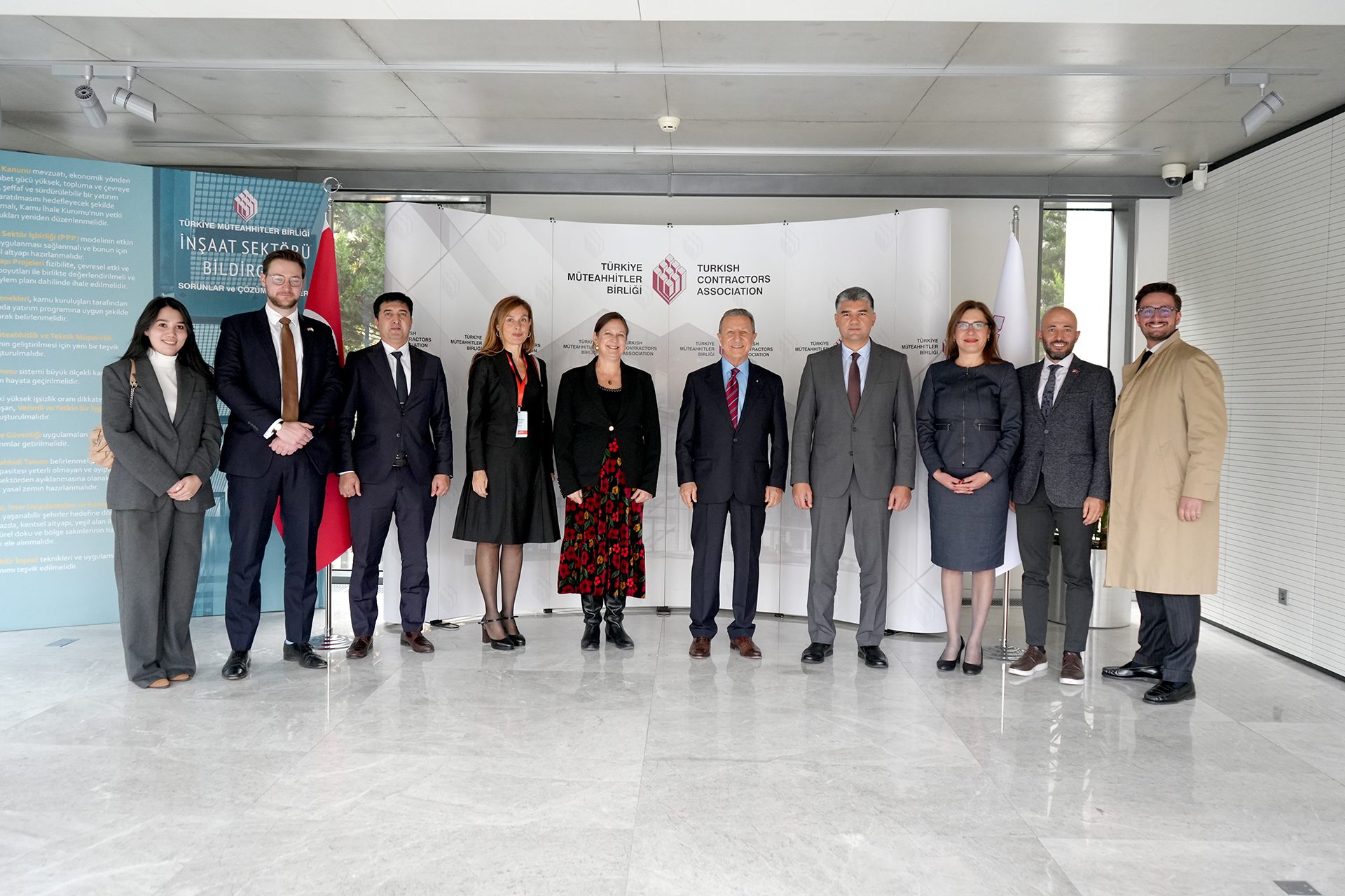 Formal wear, Social group, Suit trousers, White-collar worker, Dress shoe, Standing, Coat, Blazer