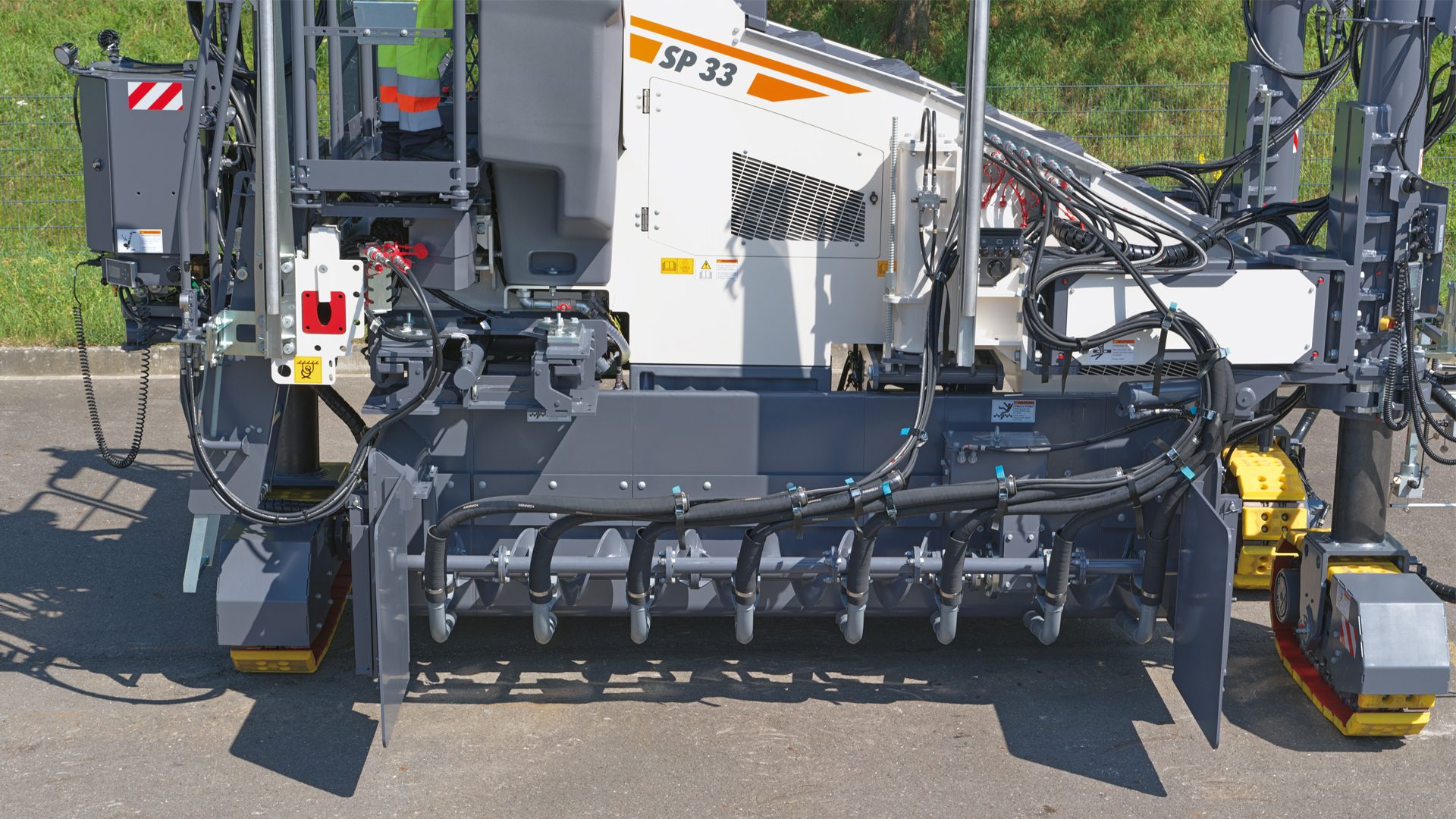 Wirtgen SP 33 slipform paver on asphalt.