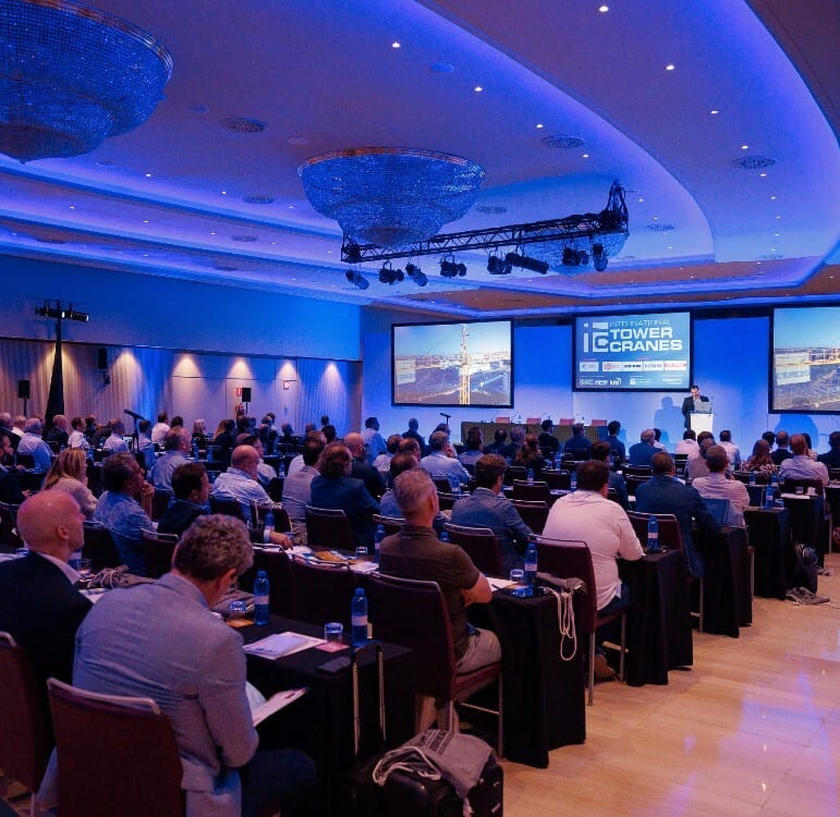 Electronic device, Conference hall, Interior design, Furniture, Chair, Event, Ceiling, Lighting, Technology