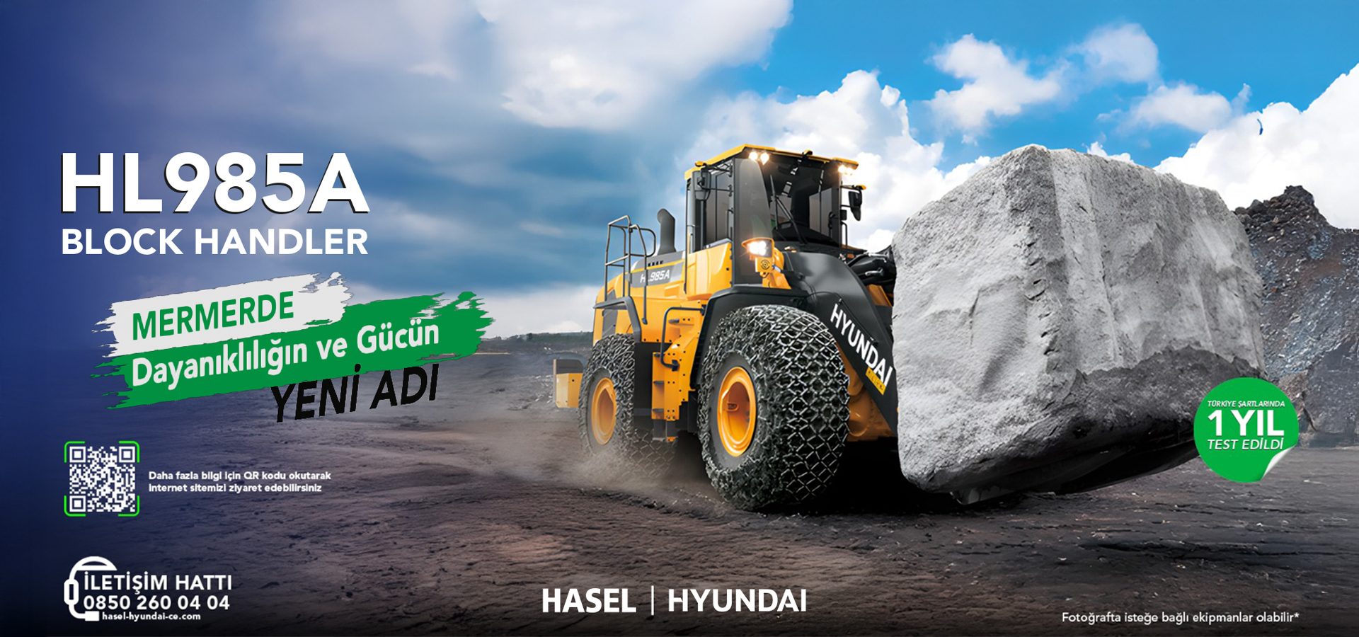 Hyundai HL985A block handler pushes a large marble block, promoted as durable, powerful, and 1 year tested.