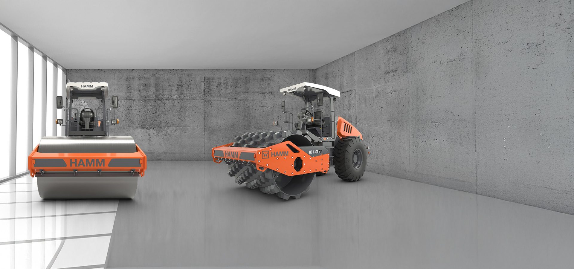 Two HAMM road rollers (smooth and padfoot) indoors.