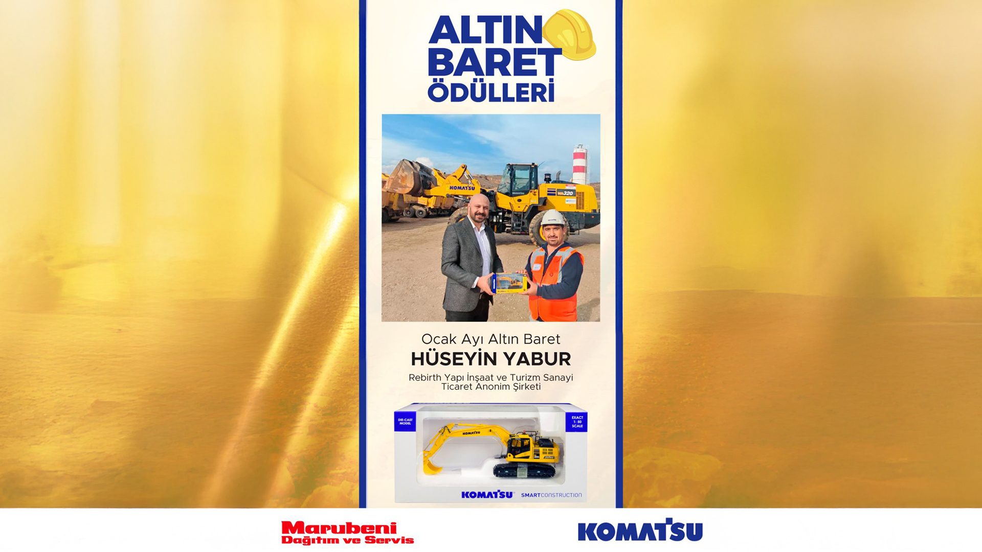 Man receives Altın Baret (Golden Hard Hat) award, Komatsu excavators in background, with model.