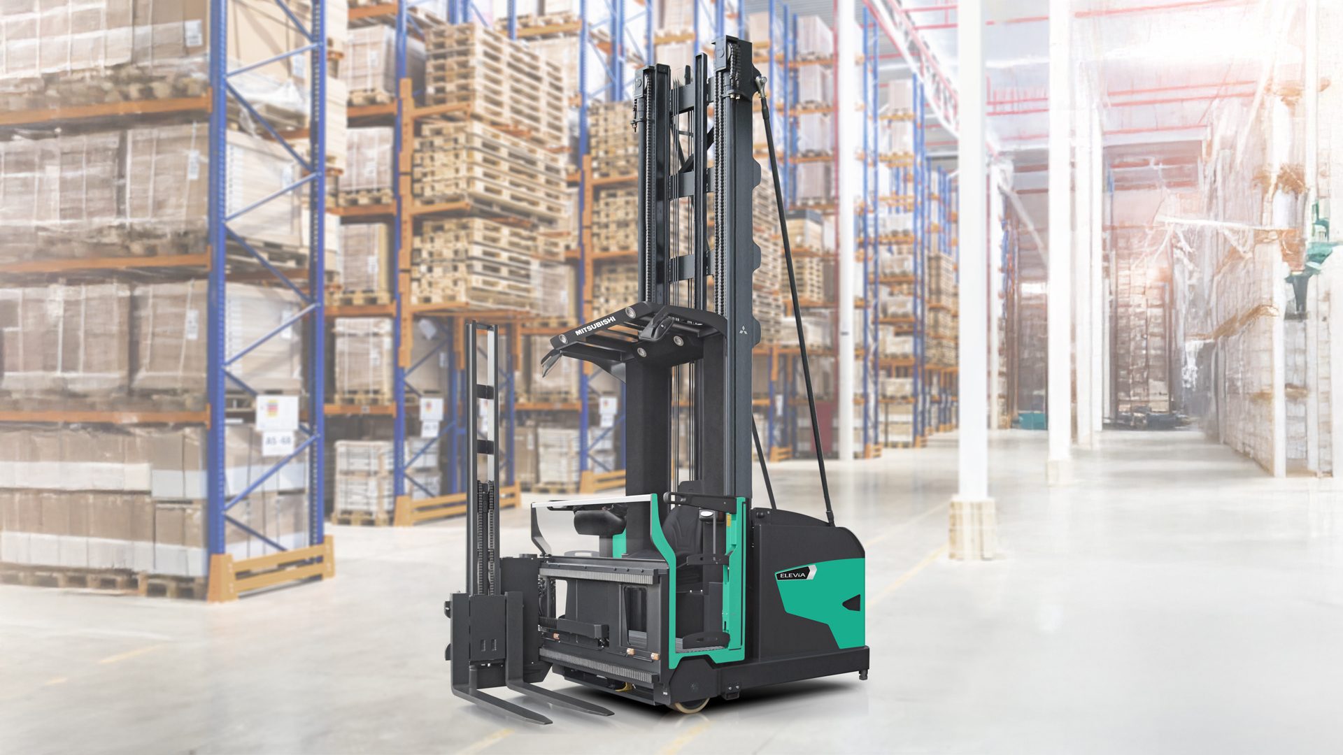 Green and black Mitsubishi reach truck forklift in a bright warehouse with tall storage racks.