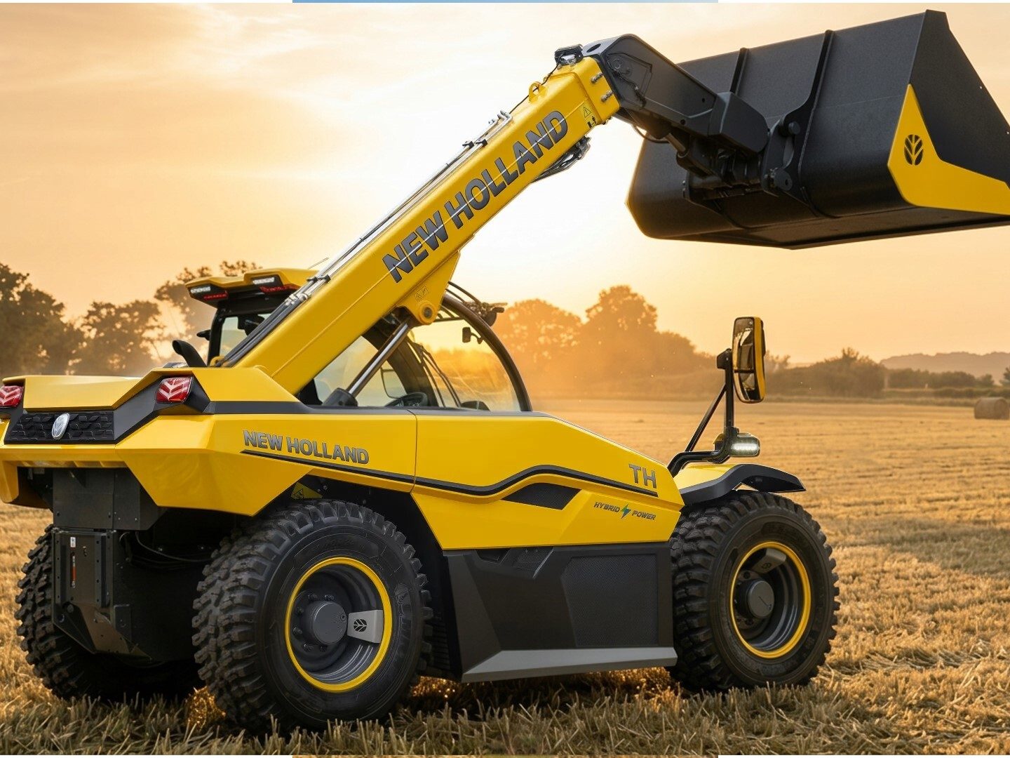 Yellow New Holland hybrid telehandler loader in a field at sunset, ready for farm work.