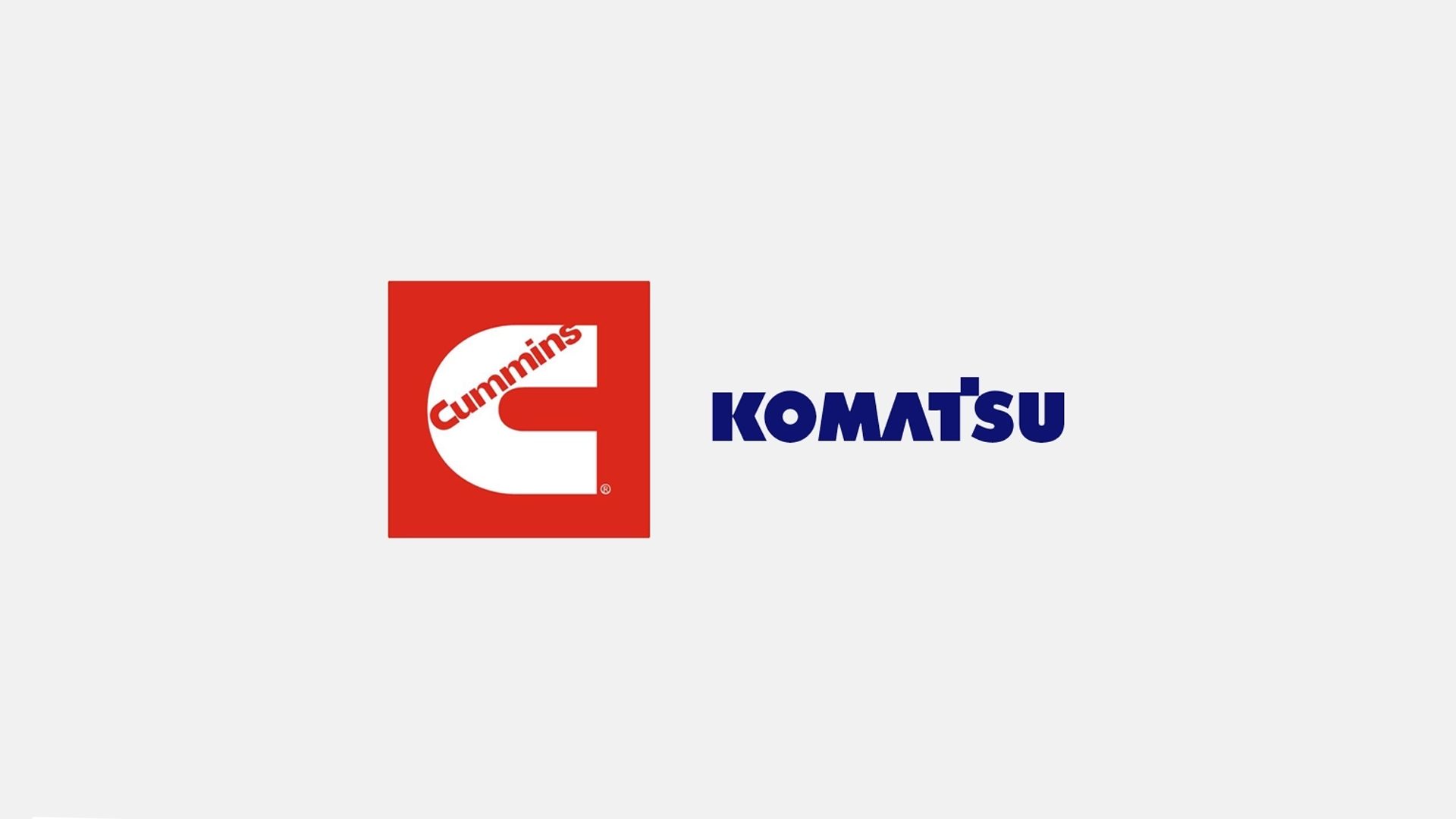 Logos of Cummins (red square with white 'C' and name) and Komatsu (blue text).