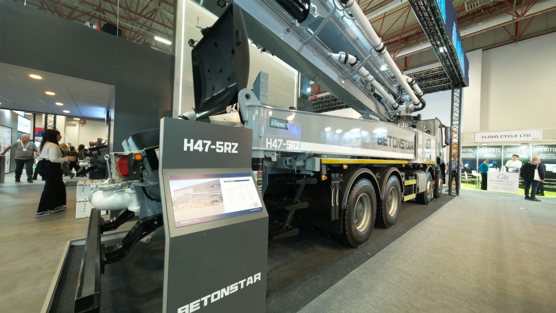 BETONSTAR H47-5RZ concrete pump truck on display at an exhibition.