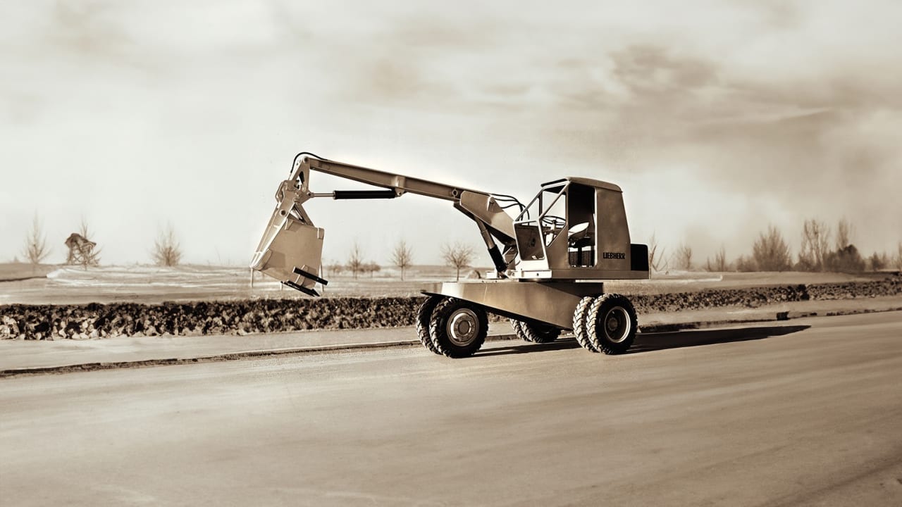 Land vehicle, Automotive tire, Road surface, Sky, Cloud, Wheel, Asphalt, Rolling