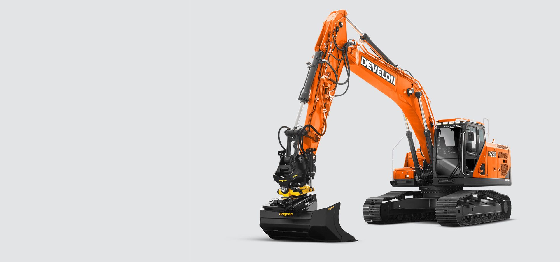 Orange DEVELON DX230 excavator with Engcon tiltrotator and bucket.