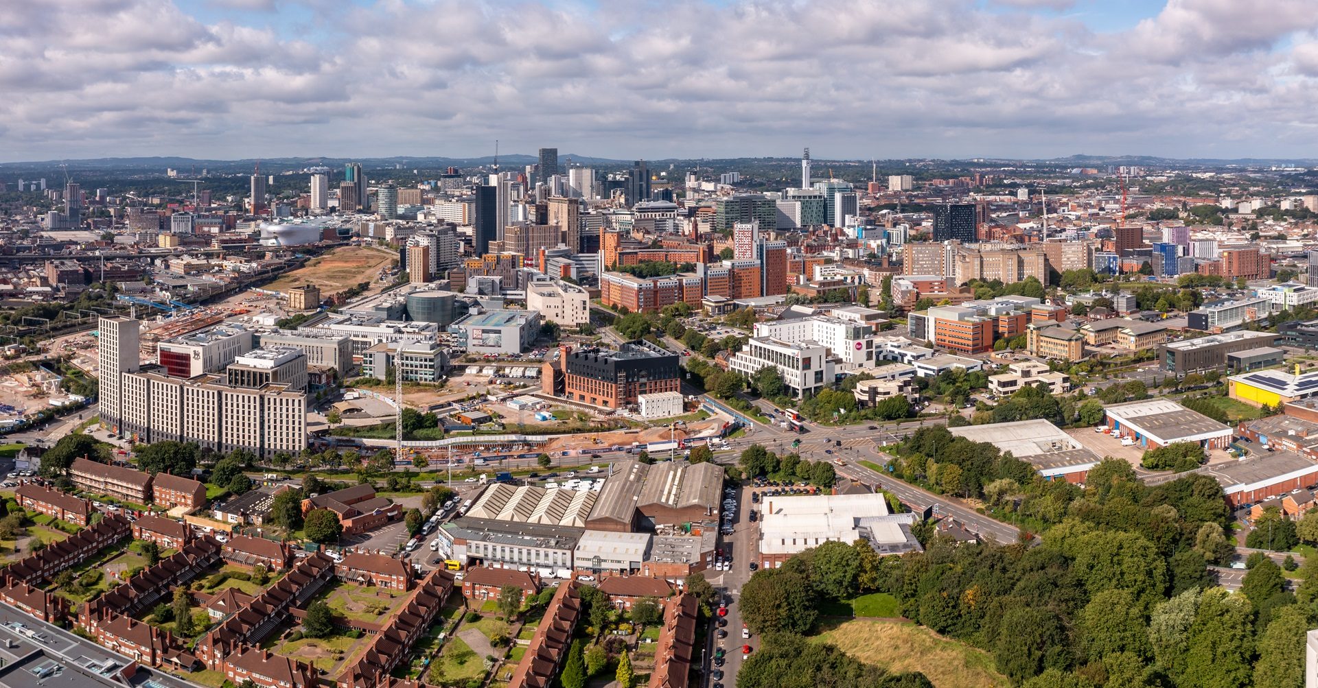 Urban area, High-rise building, City, Daytime, Roof, Horizon, Neighbourhood