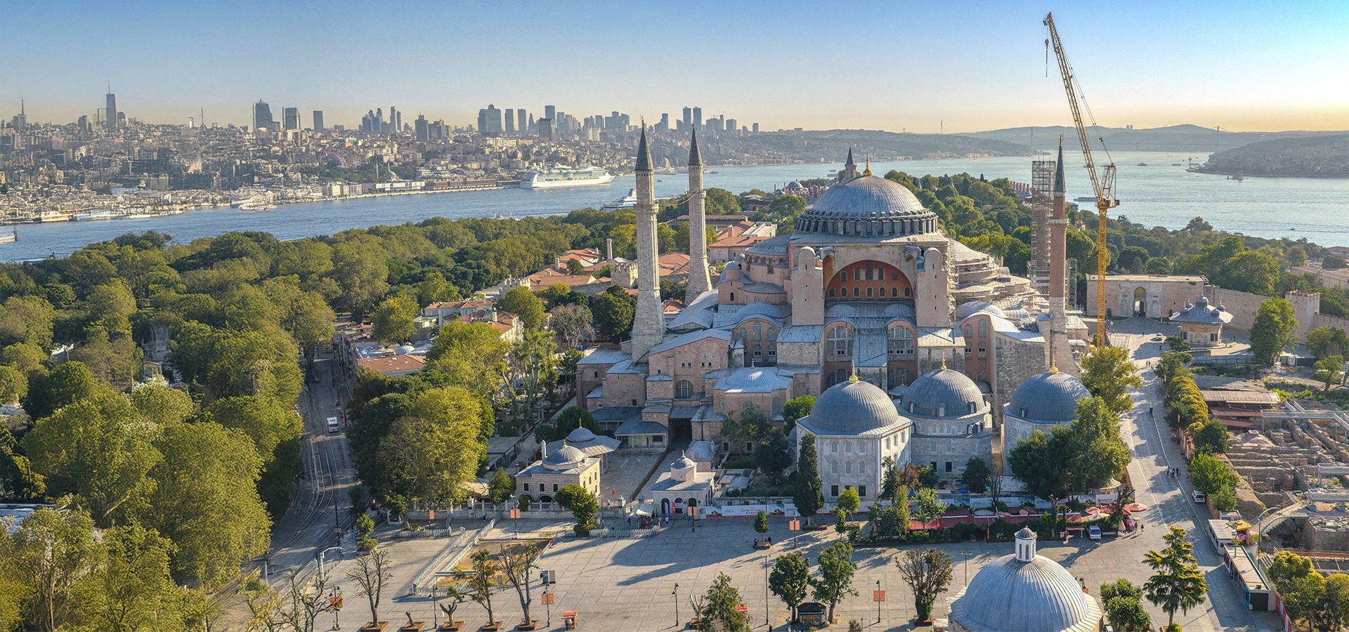 Hagia Sophia, Istanbul, with Bosphorus, city skyline, and cruise ship.