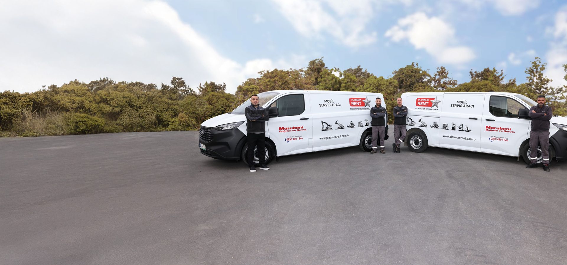 Three men next to two white Marubeni Platinum Rent mobile service vans.