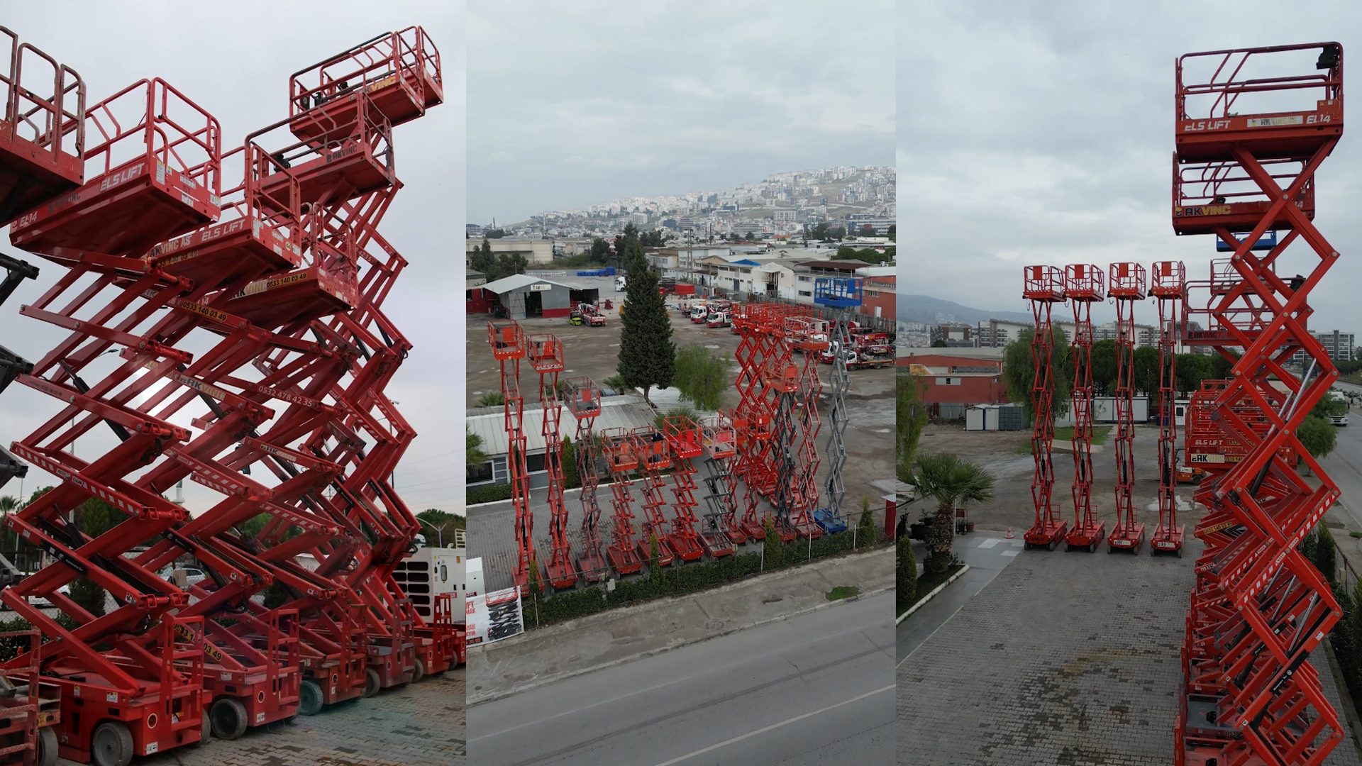 A large fleet of red scissor lifts, some fully extended, parked in an outdoor industrial yard.