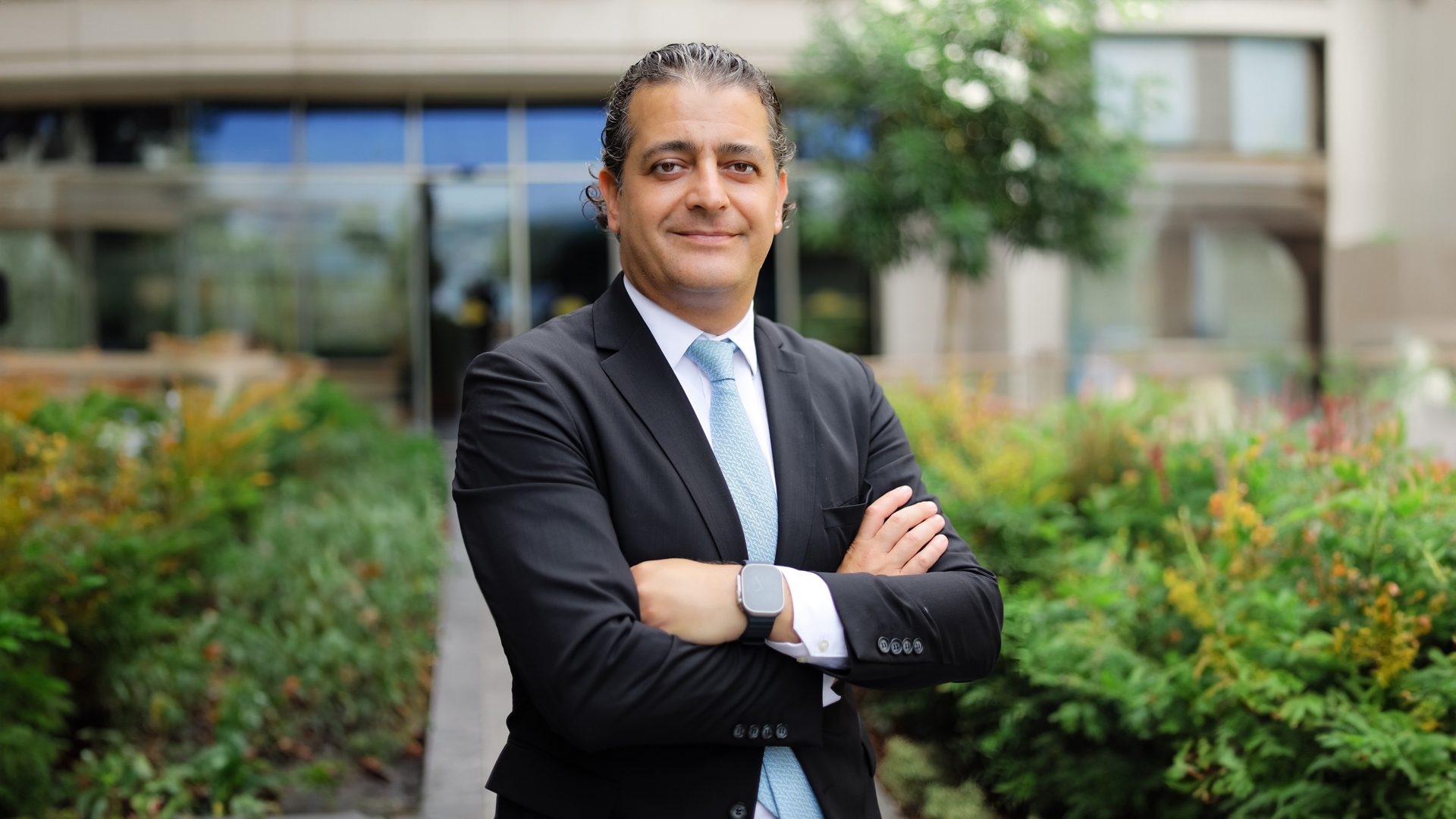 Dress shirt, Smile, Plant, Watch, Sleeve, Gesture, Collar, Grass