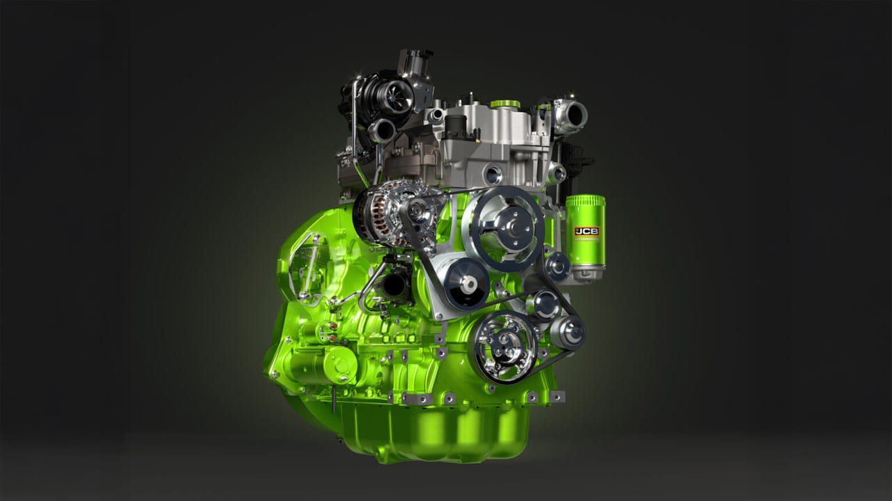 Vivid green and silver JCB hydrogen engine on a dark background.