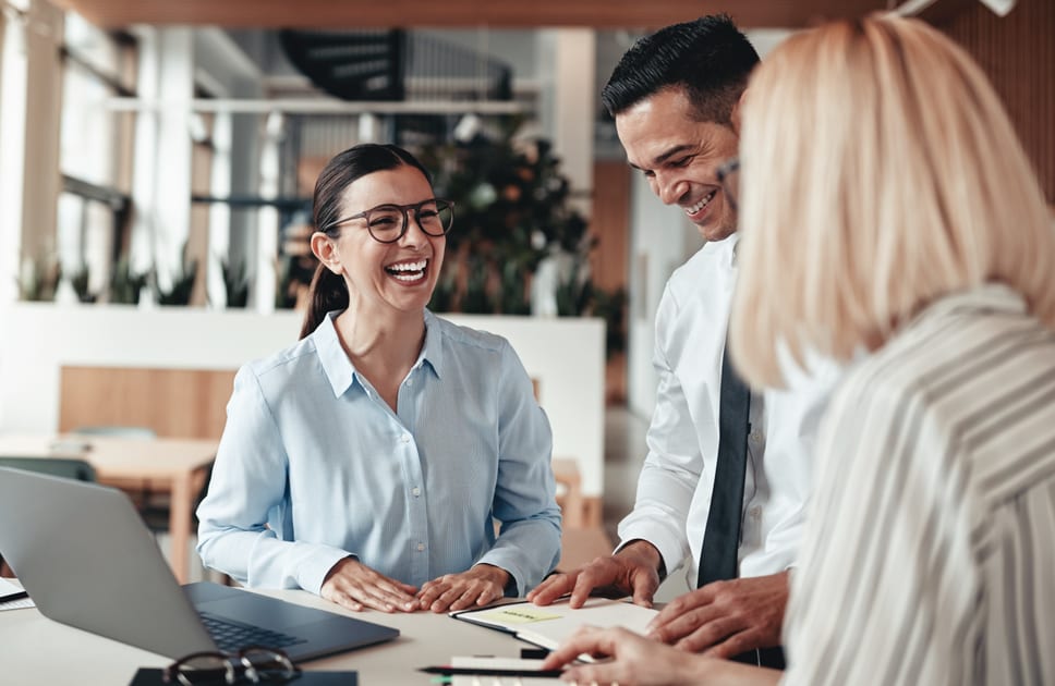 Vision care, Personal computer, Automotive design, Glasses, Smile, Hand, Table, Coat, Laptop