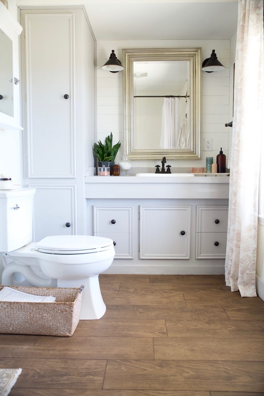 Bathroom cabinet, Plumbing fixture, Interior design, Mirror, Cabinetry, Sink, Tap, Wood, Flooring, Rectangle