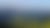 Panoramic view of Banff National Park, Canada, with snowy mountains, town, river, and forests.