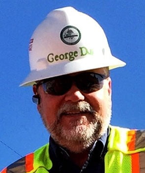 Hard hat, Clothing, Face, Helmet, Goggles, Sky, Sunglasses, Cap, Beard, Human