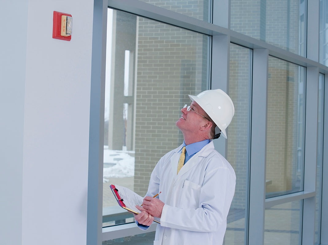 Hard hat, Glasses, Workwear, Window, Gesture, Sleeve, Fixture, Engineer