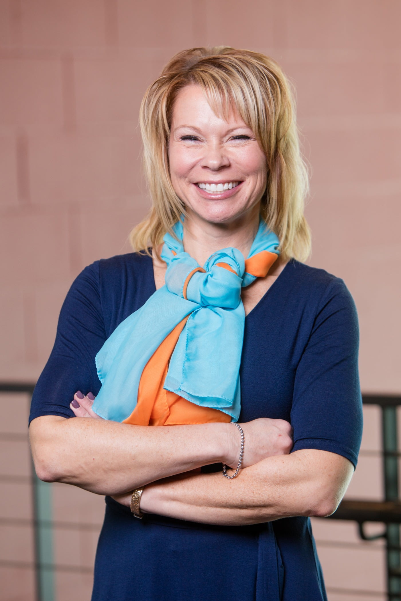 Scarf, Arms crossed, Sweater, Face, Hairstyle, Portrait, Headshot