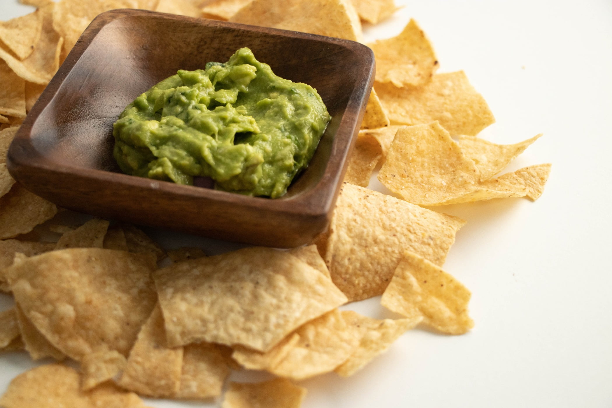 Tortilla chips, Guacamole, Wooden bowl, Crispy snacks, Chips and dip