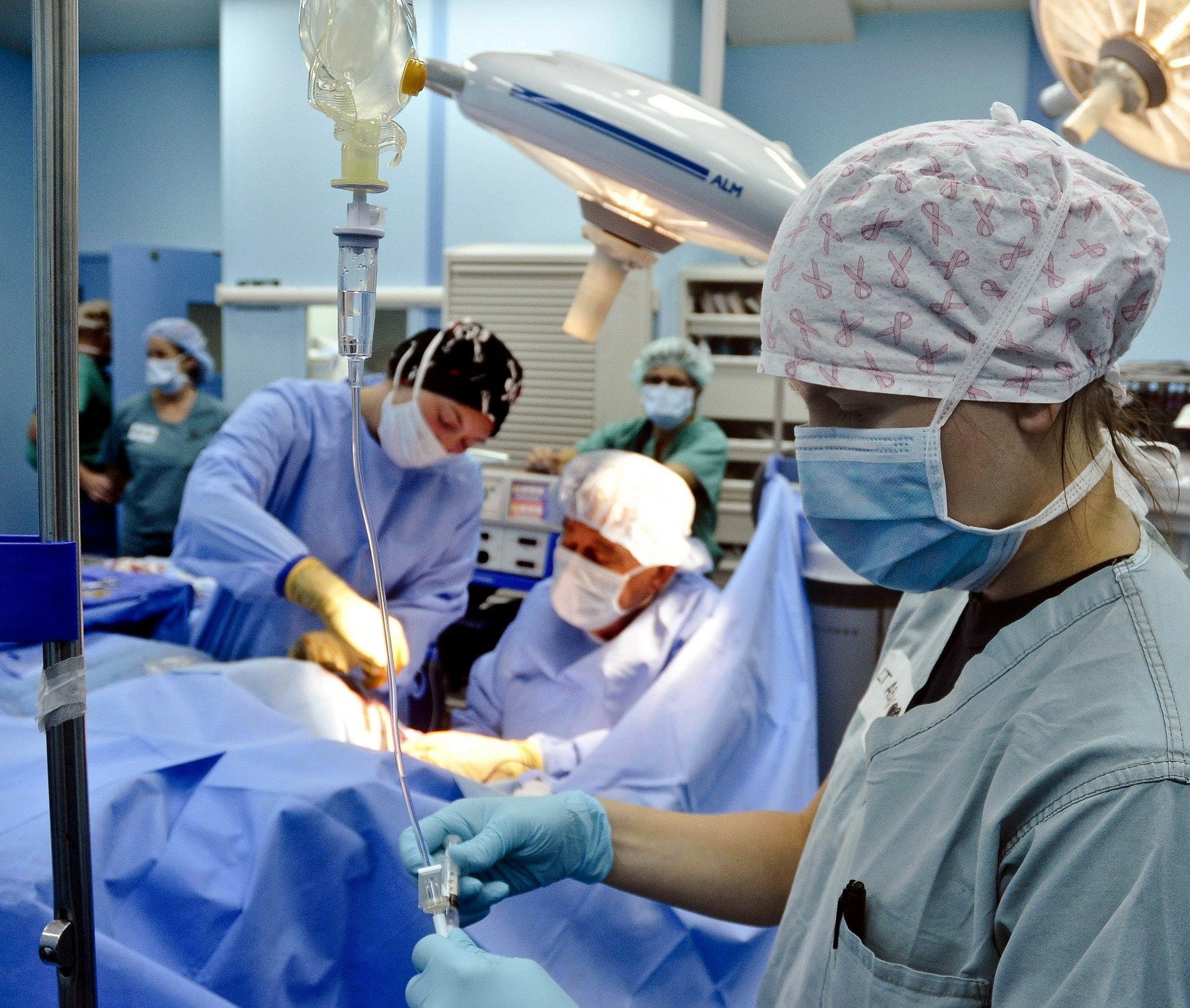 Health care provider, Medical equipment, Operating theater, Scrubs, Blue, Surgeon