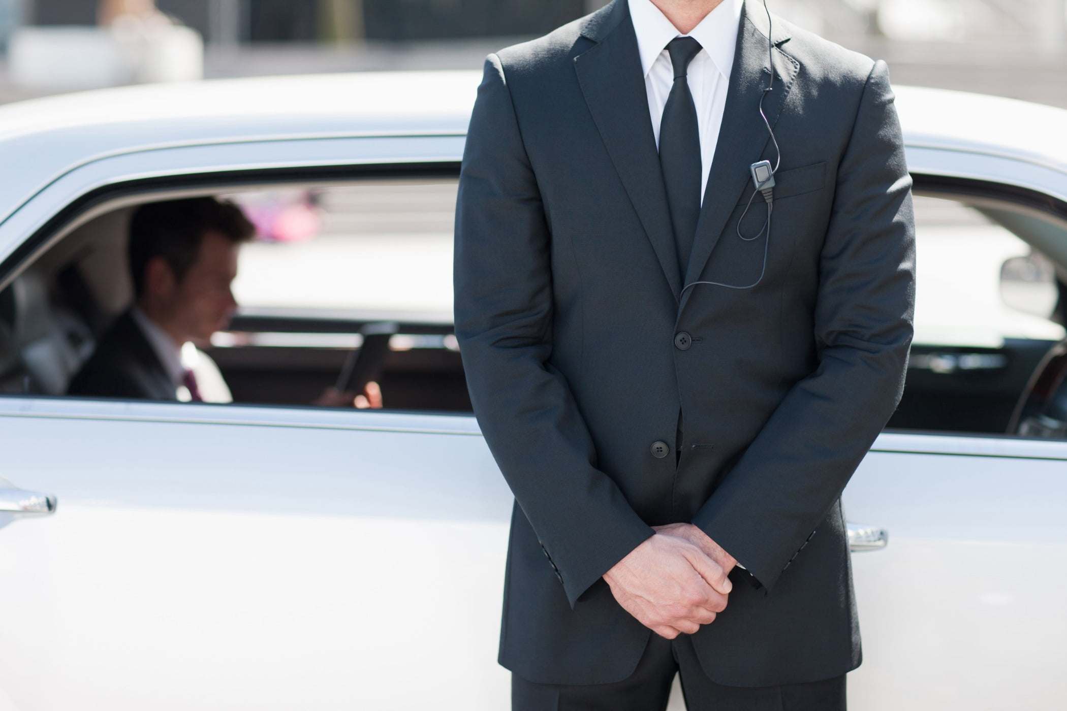 Suit trousers, Motor vehicle, Automotive design, Dress shirt, Car, Photograph, White, Hood, Sleeve