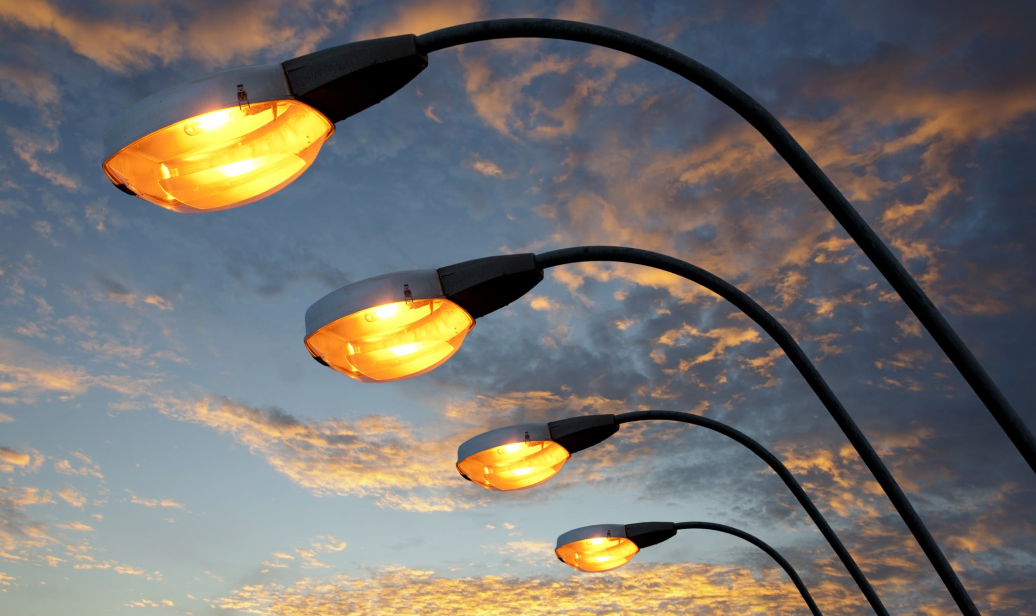 Street light, Automotive lighting, Cloud, Sky, Atmosphere, Daytime, Photograph, Amber, Nature