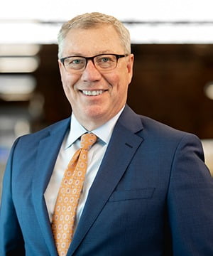 Dress shirt, Forehead, Smile, Glasses, Coat, Sleeve, Tie, Gesture, Collar, Suit