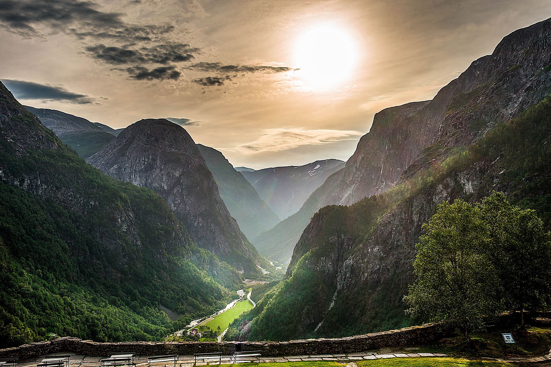 Natural landscape, Atmospheric phenomenon, Cloud, Sky, Mountain, Ecoregion, Light, World, Highland, Sunlight