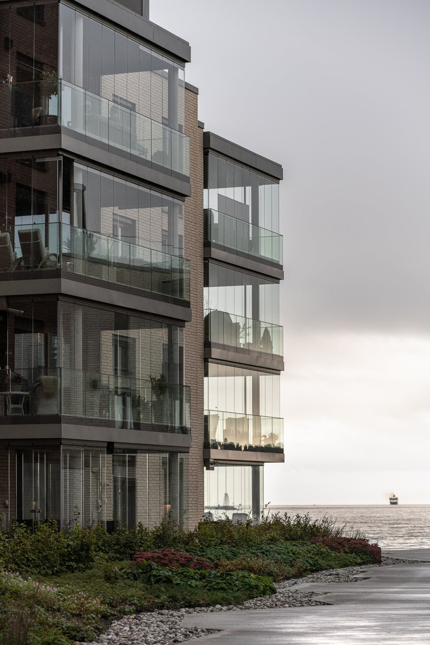 Urban design, Tower block, Plant, Water, Building, Sky, Cloud, Condominium, Window