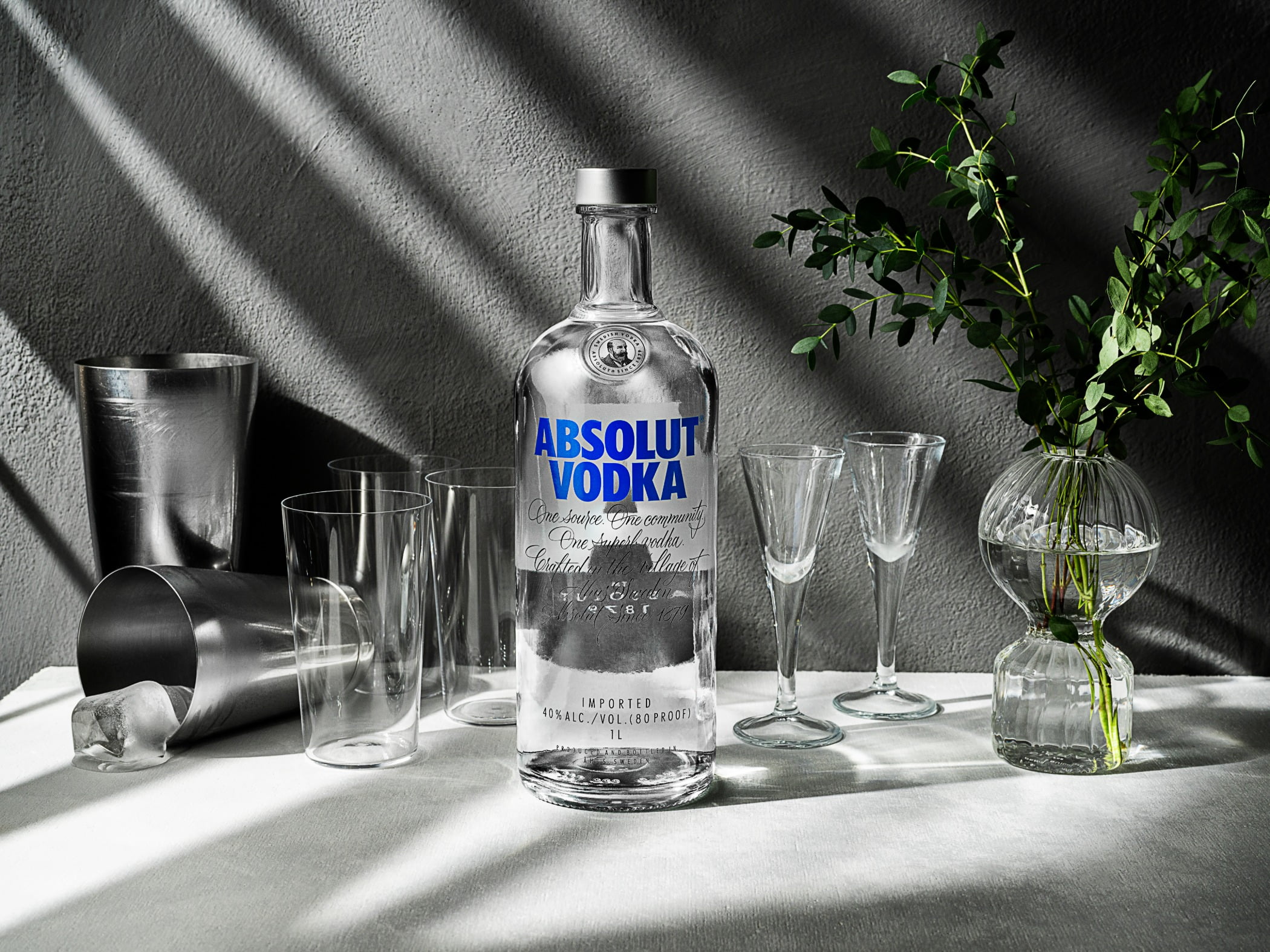 Absolut vodka, Glass bottle, Alcoholic beverage, Liquid, Drinkware, Tableware, Barware, Fluid, Drink